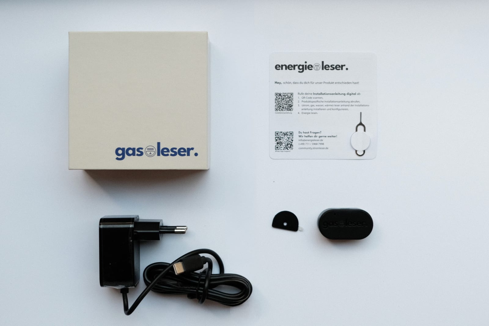 gasleser.pulse package contents: box, installation card, power adapter with USB-C cable, metal plate and the device